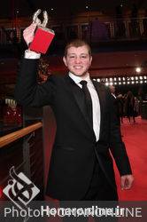 Anthony Bajon_ winner of the Silver Bear for Best Actor for _The Prayer__ poses with his award after the closing ceremony during the 68th Berlinale International Film Festival