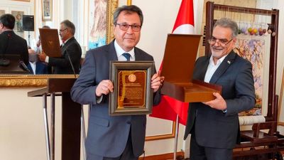 Turkish scholar Ali Temizel decorated with Iran's Shahriar Medal