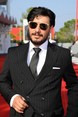091 Javad Ezzati walks the red carpet ahead of the movie Khorshid (Sun Children) at the 77th Venice Film Festival on September 06_ 2020 in Venice_ Italy.3
