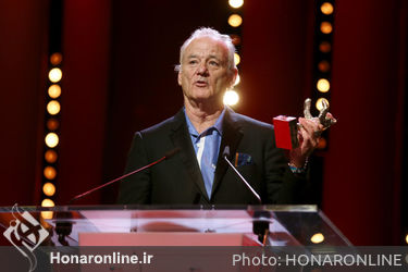 Bill Murray accepts the Silver Bear for Best Director Wes Anderson for _Isle of Dogs_ on stage at the closing ceremony during the 68th Berlinale International Film Festival