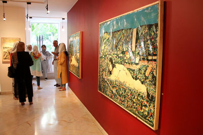 Figurative paintings influenced by Qajar style