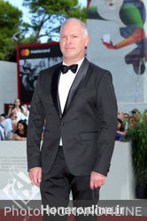 098 Vlad Ivanov walks the red carpet ahead of the _Napszallta (Sunset)_ screening during the 75th Venice Film Festival