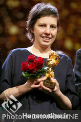 Adina Pintilie_ winner of the Golden Bear for Best Film for _Touch me not_ pose at the closing ceremony during the 68th Berlinale International Film Festival