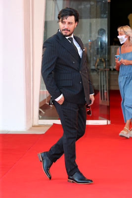 099 Javad Ezzati walks the red carpet ahead of the movie Khorshid (Sun Children) at the 77th Venice Film Festival on September 06_ 2020 in Venice_ Italy5