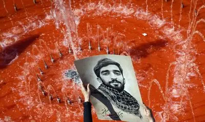 تشییع شهید حججی از نگاه هنرمندانه عکاسان / گزارش تصویری