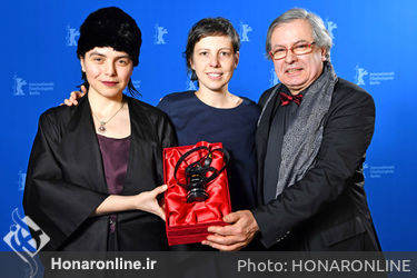 Bianca Oana_ Adina Pintilie and Philippe Avril pose with the Golden Bear award for Best Film _Touch Me Not_ at the award winners photo call during the 68th Berlinale International Film Festival