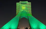 نقش پرچم حرم رضوی بر برج آزادی تهران