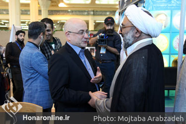 بازدید علی مرادخانی از نمایشگاه قرآن 