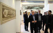 بازدید علی مرادخانی از نمایشگاه قرآن 