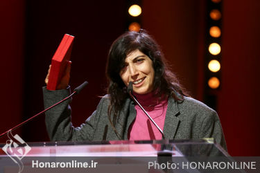 Ines Moldavsky receives the Short film Award in Gold for the movie _The Men Behind the Wall_ at the closing ceremony during the 68th Berlinale International Film Festival