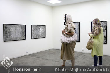 نمایشگاه عکس های امین طلاچیان با عنوان "قطعه 41 " در گالری اُ