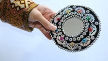 دغدغه آرایه‌های تزئینی و رودوزی‌های ایرانی روی میز یک انجمن صنفی