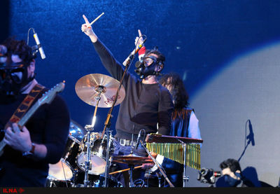 Rockers dressed in gas masks perform in memory of Sardasht tragedy victims