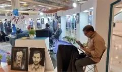 طراحی چهره خادمان قرآنی در غرفه انجمن خادمان قرآن کریم