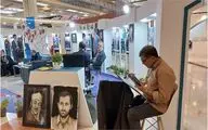 طراحی چهره خادمان قرآنی در غرفه انجمن خادمان قرآن کریم