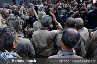 گِل‌مالی آیین کهن عزاداری عاشورا در لرستان‎