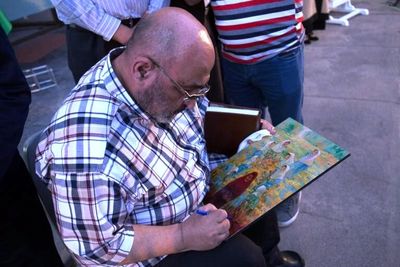 Iranian artist dedicates painting to mothers of Afghanistan school attack victims
