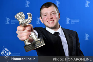 Anthony Bajon poses with the Silver Bear for Best Actor for _The Prayer_ at the Award Winners photo call during the 68th Berlinale International Film Festival