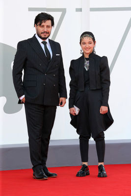 0991 Javad Ezzati and Shamila Shirzad walk the red carpet ahead of the movie Khorshid (Sun Children) at the 77th Venice Film Festival on September 06_ 2020 in Venice_ Italy.