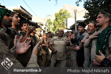 گِل‌مالی آیین کهن عزاداری عاشورا در لرستان‎