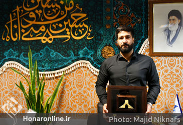 اعطای نشان آزادی ملت ایران به قهرمان شاهچراغ فرزاد بادپا